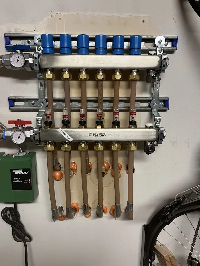 Plumber performing Water Heater Repair at a residential property in Clifton Heights